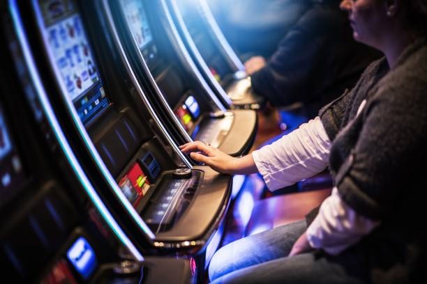 angkanet platform dashboard showing football betting, live casino, and slots sections on mobile screen